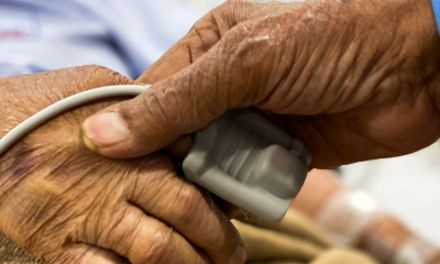 Doctor helping patient