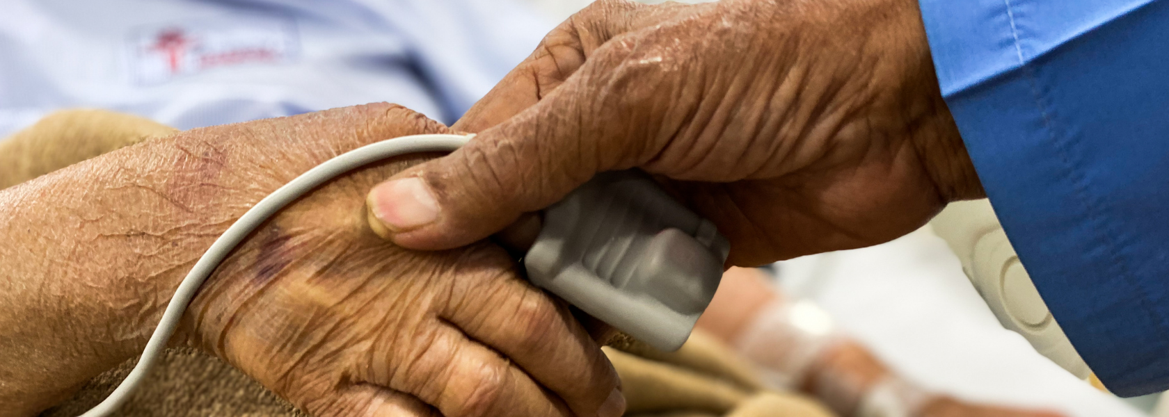 Doctor helping patient
